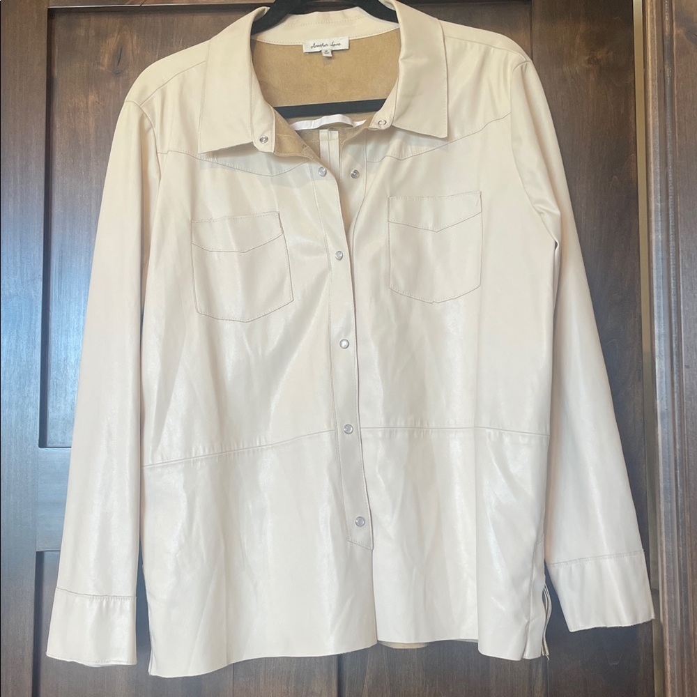 Western style cream colored pleather jacket.